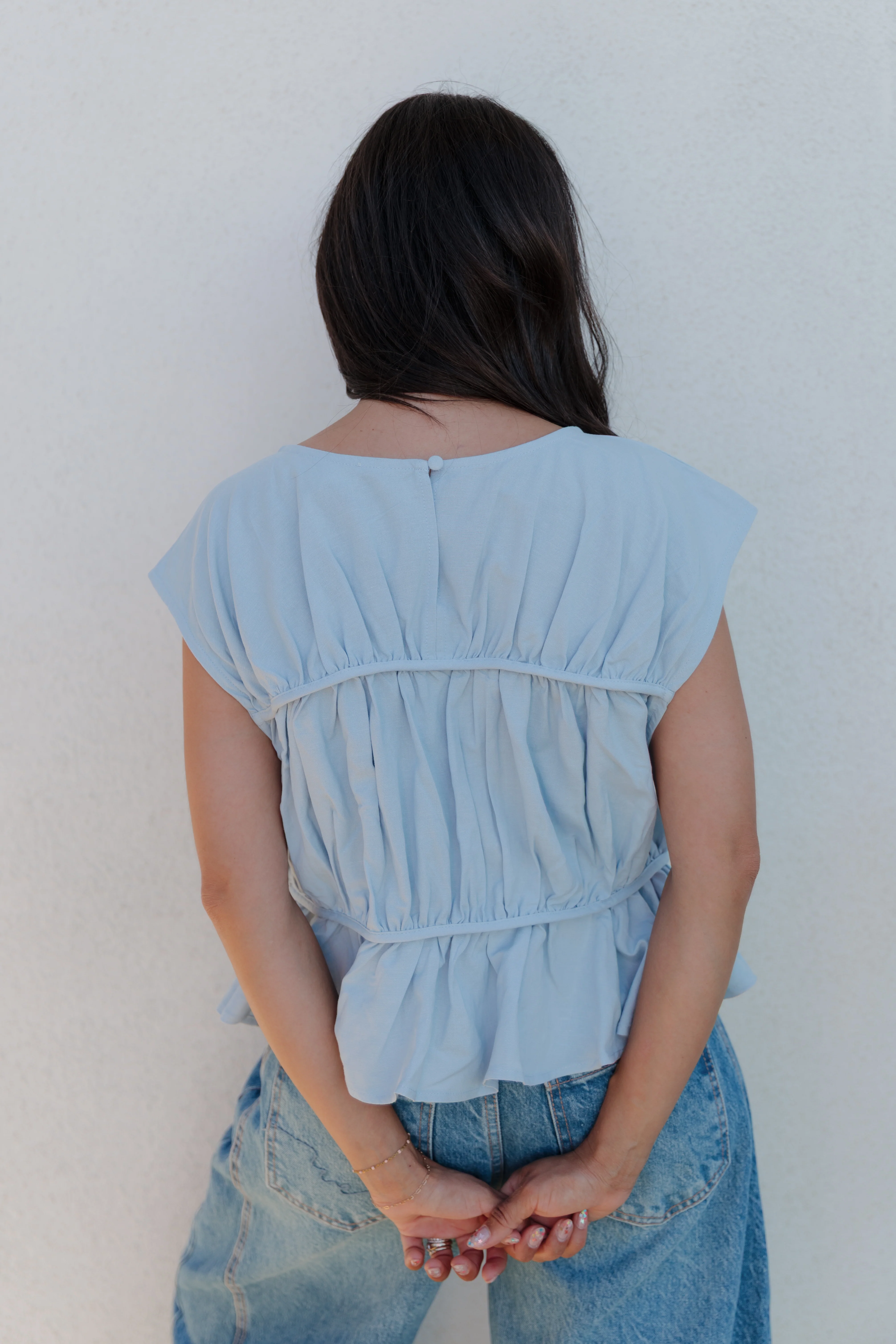 THE ANDREA RUCHED PEPLUM TOP IN SKY BLUE - Image 5