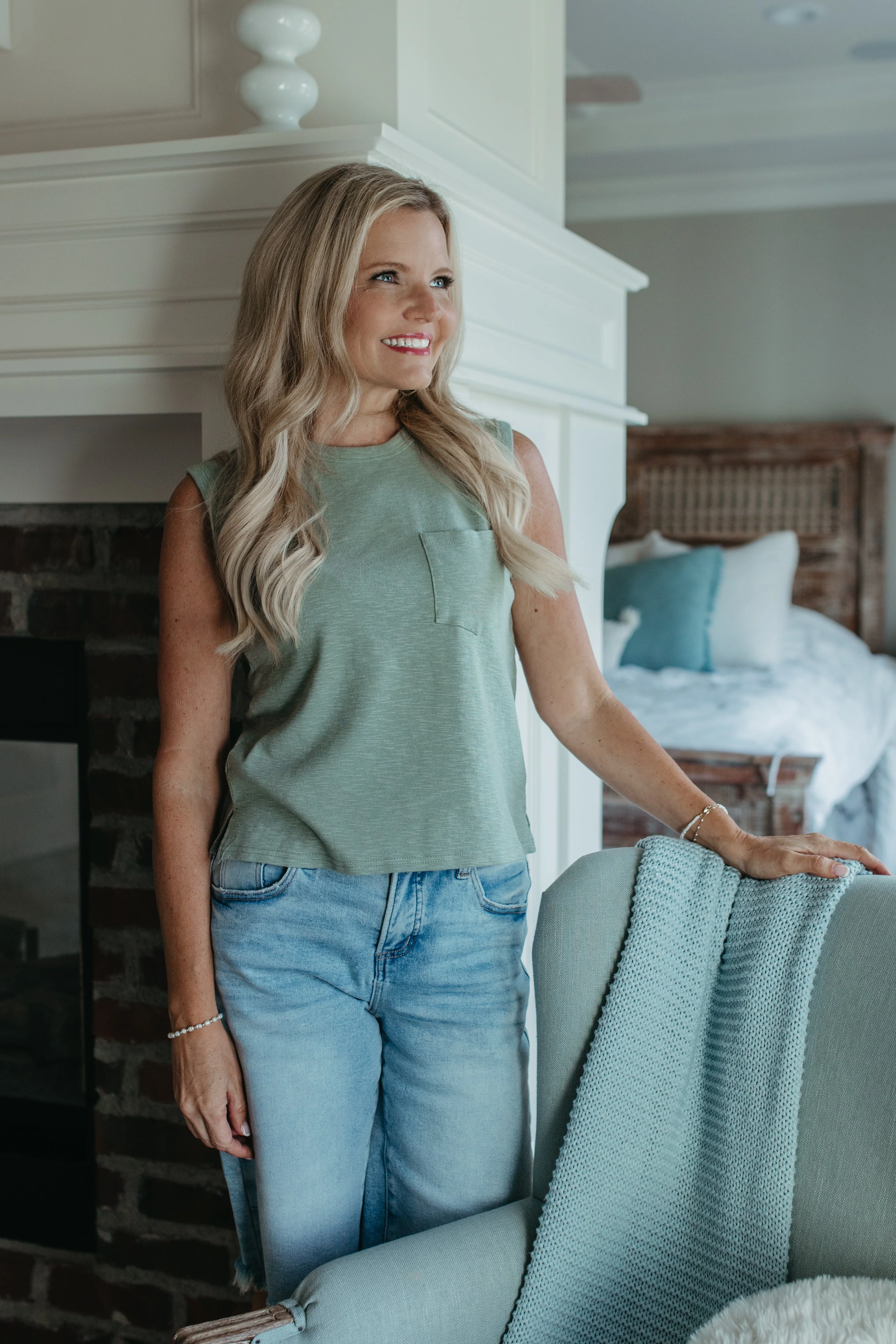 THE KHYLEE  SLEEVELESS COTTON TOP IN SAGE GREEN
