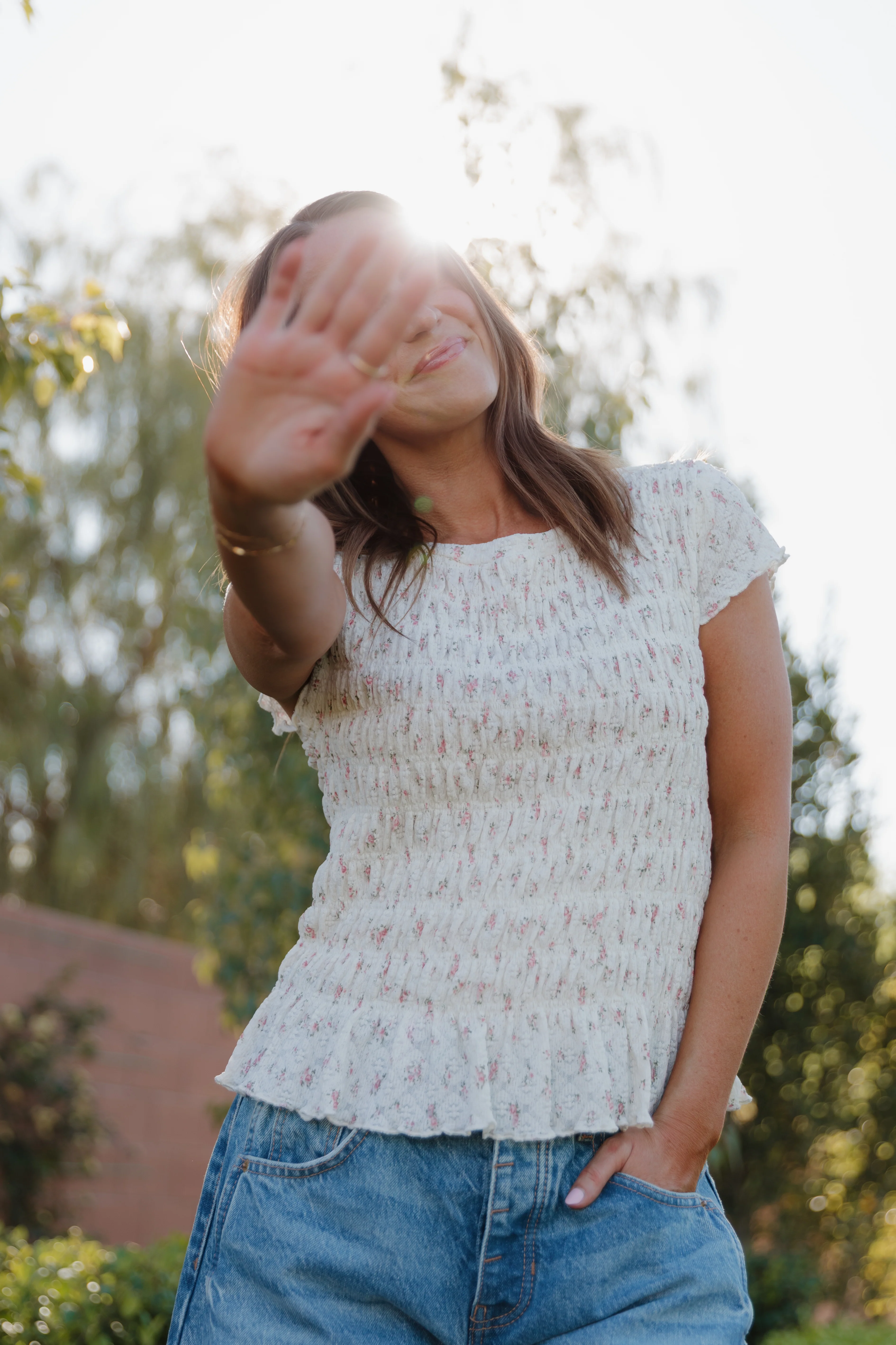 THE MADISON SMOCKED FLORAL TOP IN CREAM - Image 4