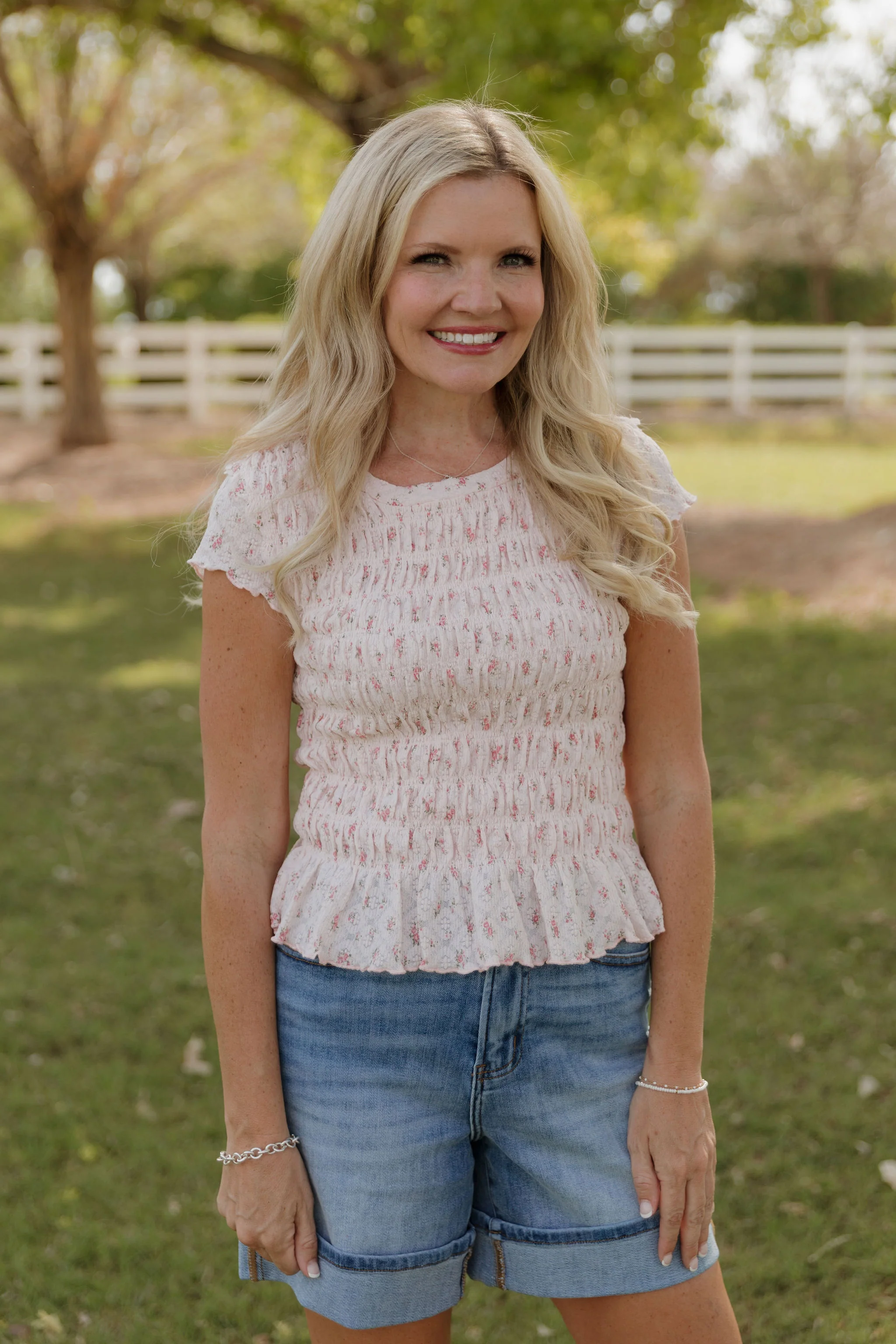 THE MADISON SMOCKED FLORAL TOP IN PINK - Image 2