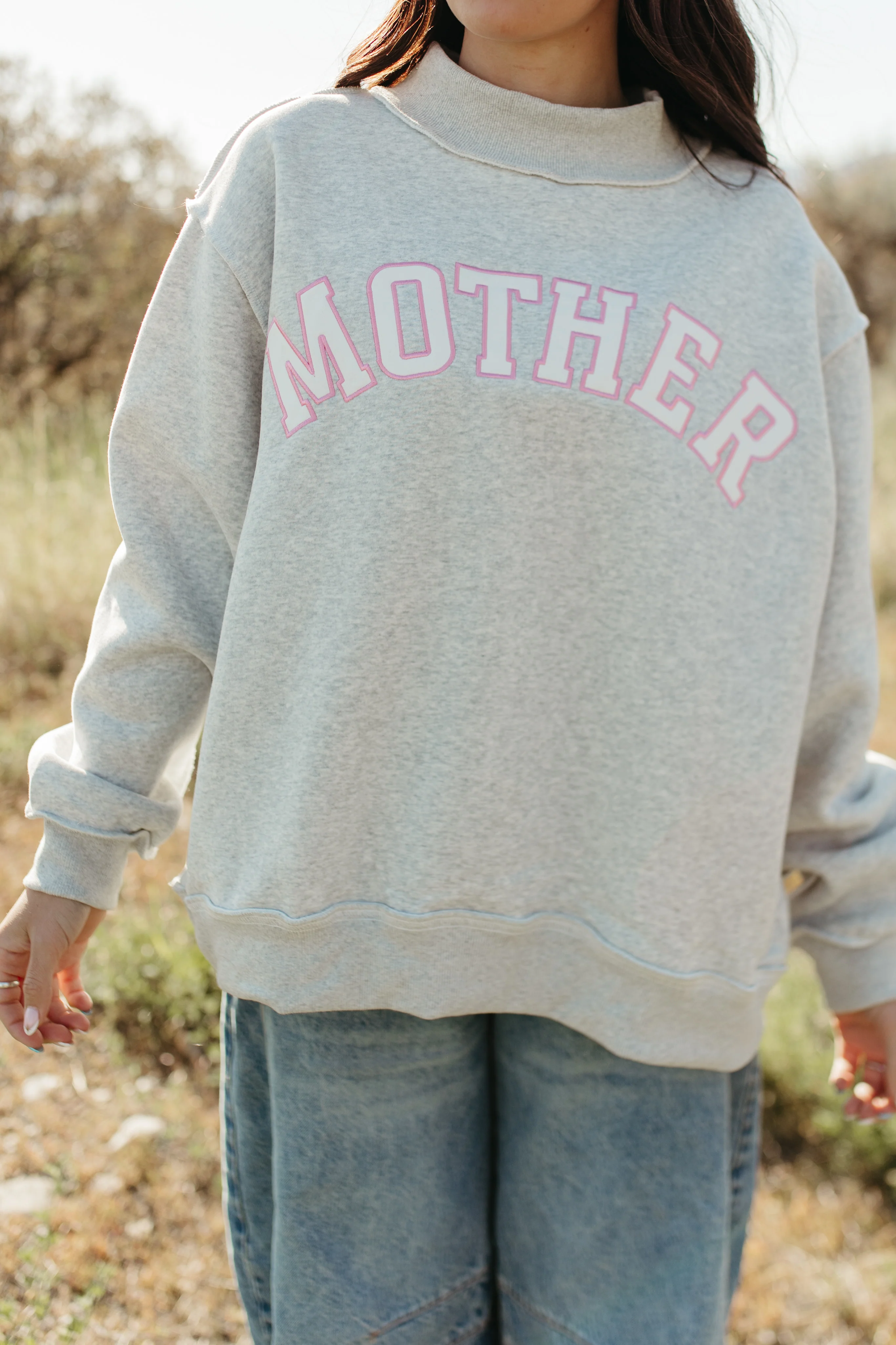THE MOTHER MOCK NECK IN GREY AND PINK