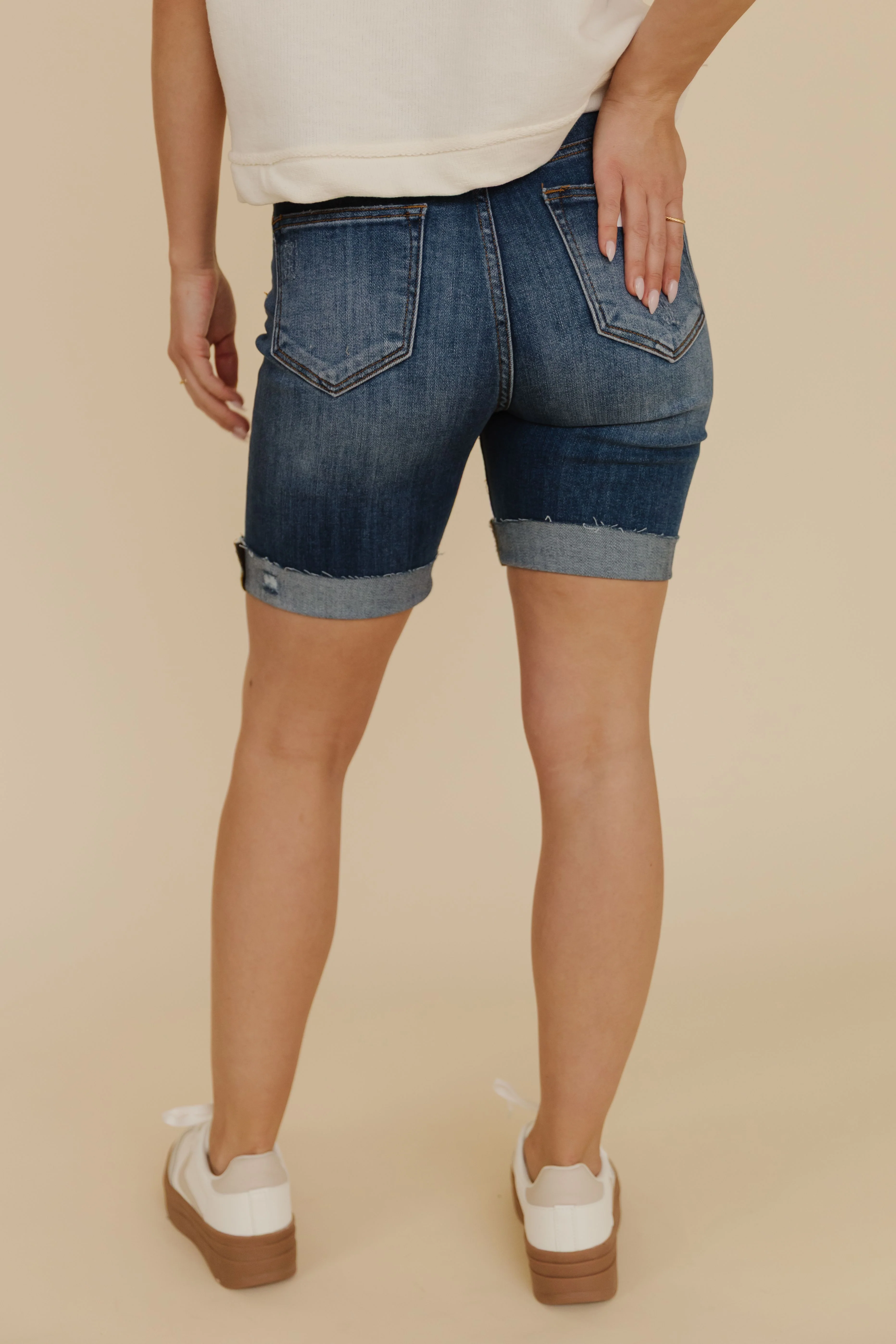 THE SCOUT HIGH RISE DISTRESSED SHORTS IN DARK DENIM - Image 6
