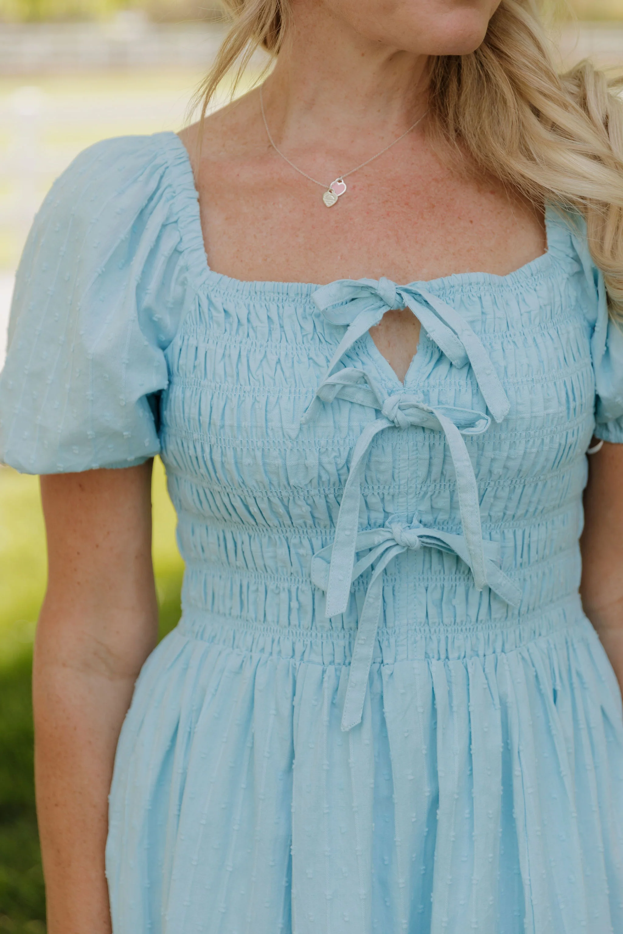 THE SUZANNAH BOW DETAIL DRESS IN BLUE - Image 6